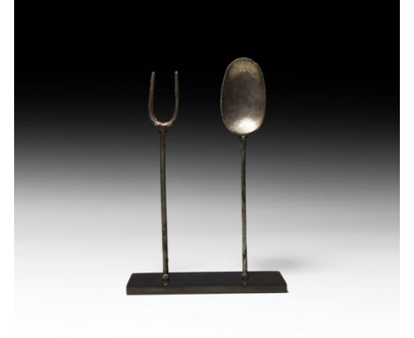 2nd century AD. A matched silver cutlery set comprising a spoon with long parallel-sided bowl, chamfered rim, hexagonal-secti