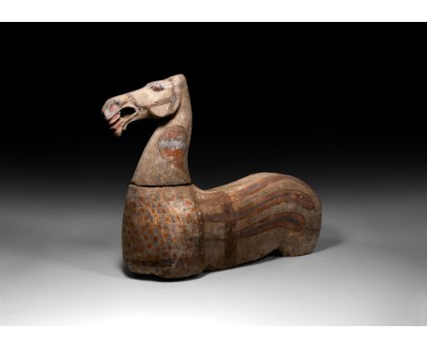 Han Dynasty, 206 BC-220 AD. A hollow-formed ceramic figurine of a horse in two sections, the body with sleek profile and pain