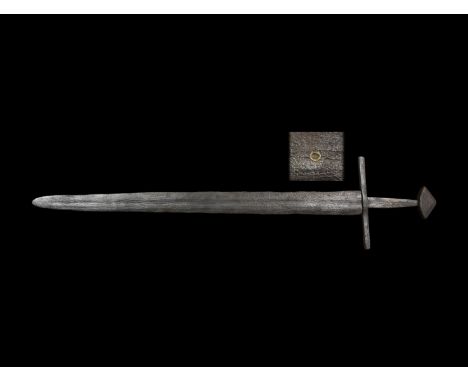 Mid 10th-late 12th century AD. A long double-edged sword of Oakeshott Type Xa and Petersen Type X with tapering elegant blade