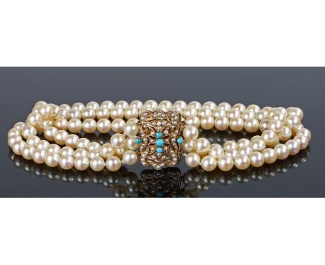 Pearl necklace, the three string necklace with a 9 carat gold clasp set with pearls and turquoise, 34cm long 