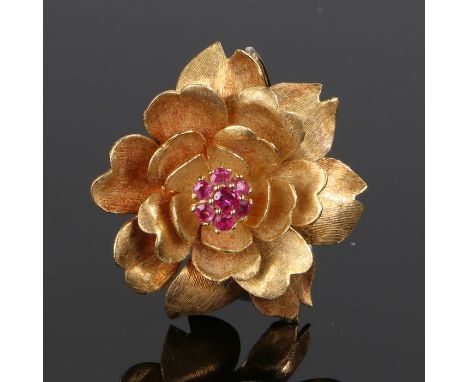 18 carat gold and ruby set brooch, in the form of a flower, 13.7 grams, 36mm diameter 