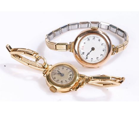 Ladies 18 carat gold wristwatch, the white dial with Arabic numerals, manual wound, the case 21mm diameter, on a gilt sprung 