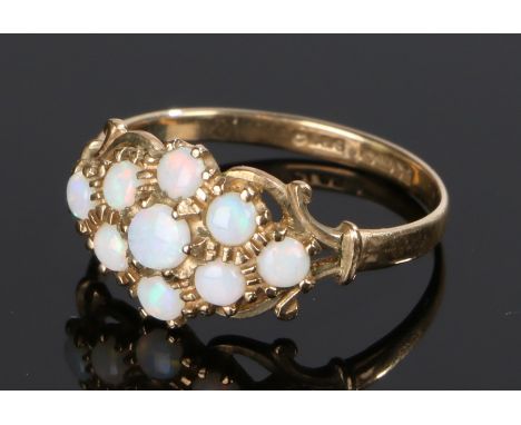 9 carat gold opal set ring, with nine opals to the head, ring size O