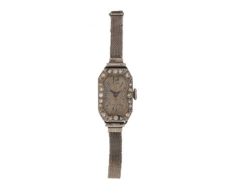 Platinum and diamond cocktail watch, the dial with Art Deco style Arabic numerals, the rectangular case with diamonds to the 