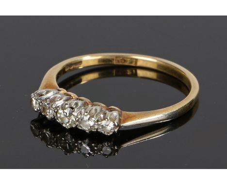 18 carat gold diamond set ring, with five round cut diamonds to the head, ring size L