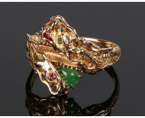 14 carat gold ruby and emerald set double headed dragon ring, the dragon heads each set with emeralds and rubies, ring size V