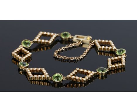 Peridot and Pearl bracelet with diamond shaped links set with pearls interspersed with peridot.