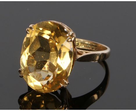 9 carat gold citrine set ring, with a facetted head and four claws, ring size L