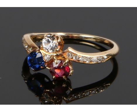 18 carat diamond, ruby and sapphire ring, with diamond set shoulders, ring size P, 2.7g