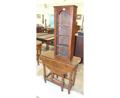 An oak gate-leg drop-leaf table fitted with an end drawer, 91.5 x 85cm open, an oak child's solid-seat armchair and a set of 