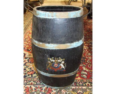 A coopered oak brass-bound barrel with transfer-printed royal cipher, 61cm high and a metal-bound car trunk, (one catch damag