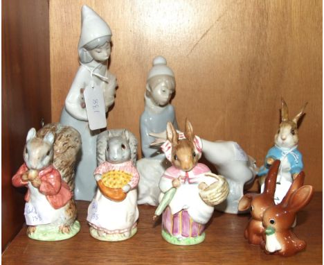 Four Beswick Beatrix Potter figures: 'Goody Tiptoes', 'Timmy Tiptoes', 'Mrs Rabbit', (small chips to end of umbrella), 'Peter