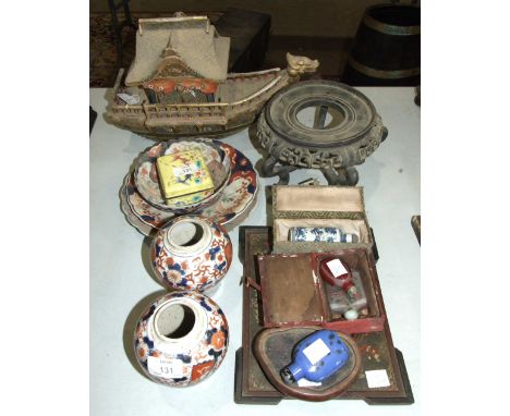 Two 19th century Chinese Imari baluster shape jars, 13cm high, (covers lacking), a 20th century Oriental enamel lidded box de