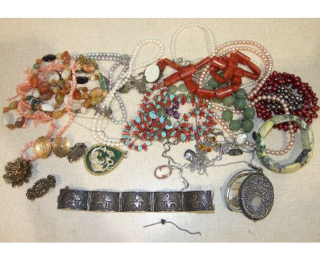 An 800-silver bracelet, a sterling silver and marcasite lizard brooch, various freshwater pearl and bead necklaces and other 