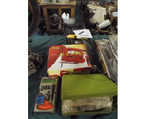 A Collection of Electric and Other Tools to Include Jigsaw, Mini Grinder Set, Electric Engraver 