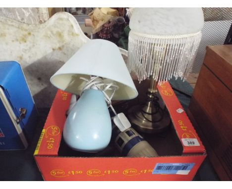 A Box of Sundries to Include Vintage Flask, Two Table Lamps, Vintage Razor 