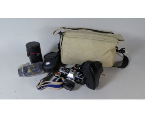 A Canvas Bag Containing Olympus OM10 35mm Camera, Telescopic Lens, Pentax Camera Etc