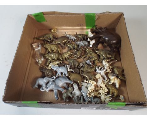 A Box Containing Large Quality of Brass and Ceramic Elephant Ornaments 
