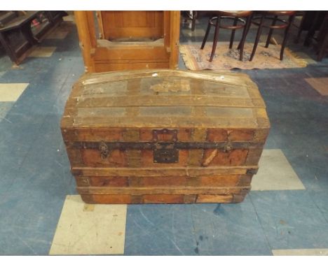 A Vintage Dome Top Travelling Trunk with Brass and Metal Banding, 77cm Long