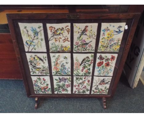 An Oak Framed Tapestry Fire Screen Depicting Nature's Year 