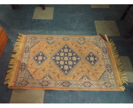 A Small Rectangular Rug, 110cm Long 