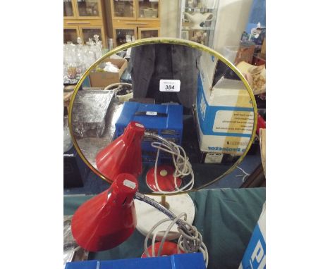 A Convex Circular Mirror and an Adjustable Reading Lamp
