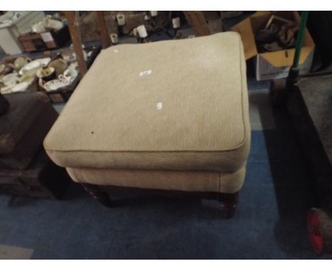 An Upholstered Foot Stool