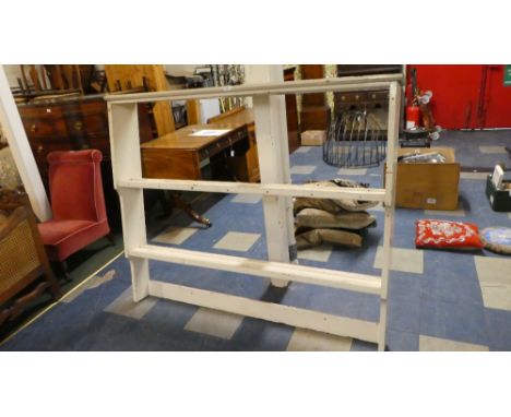 A White Painted Two Shelf Dresser Rack, 149cm Long