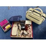 A mixed lot containing opera glasses, threepenny bracelet, gold mounted cigarette holder, pipes,