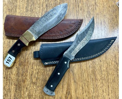 Two hunting knives.