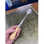 A Victorian silver stilton scoop, London (SH & L).