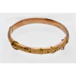A 9ct gold 'buckle' bangle, approx 8.5g.