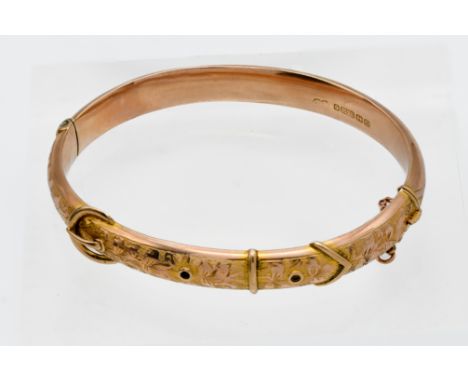A 9ct gold 'buckle' bangle, approx 8.5g.