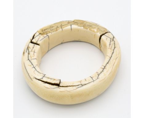 A Ugandan ivory bangle, 19th century, on bespoke square based plinth, 5in. (12.7cm.) diameter.