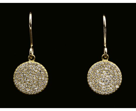 A pair of 18ct yellow gold and diamond pavé set disc earrings, the 12mm. discs on hook fittings, total diamond weight 1.15 ct