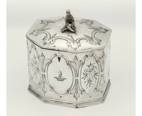 A George III Sheffield plate tea caddy, octagonal form, decorated with engraved mirror form reserves, four with floral sprays