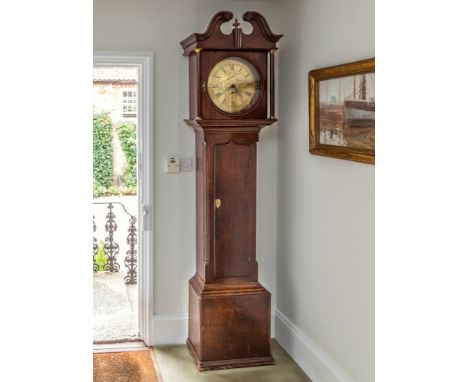 An 18th century oak 30 hour longcase clock by Jno. Ramsbottom, c.1770, the 13in. circular Roman brass dial with foliate engra