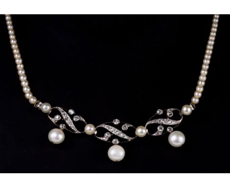 A vintage diamond and pearl necklet, Continental, 1930s-40s, with three oval open settings in white gold plated silver, each 