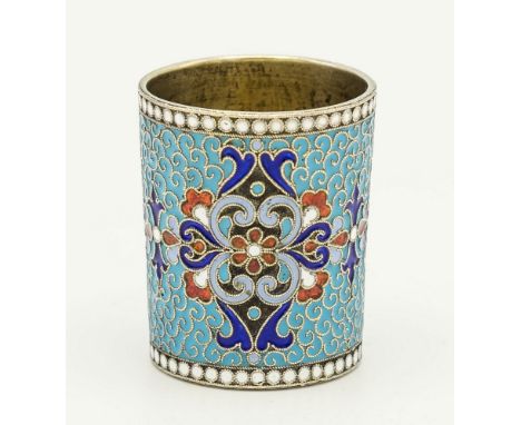 A Russian enamelled silver gilt vodka tot, by Vasily Agafonov, Moscow 1895-1908, the silver gilt beaker of simple tapering fo