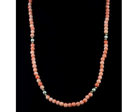 A 9ct gold, cultured pearl and coral necklace and bracelet, mid-20th century, the necklace 15in. (38cm.) long, the bracelet 7