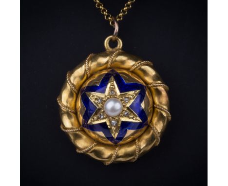A Victorian 18ct gold, enamel, seed pearl and diamond pendant locket, the domed pendant with cobalt blue enamelled star enclo