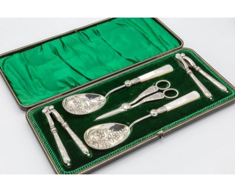 A good Victorian cased silver plated fruit and nut set, containing a pair of berry spoons with mother of pearl handles, two p