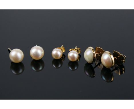 Two pairs of 9ct gold and pearl stud earrings, one pair 7mm. pearls and the other 5mm. pearls; together with a pair of 9ct go