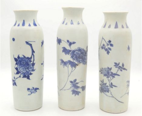 A matched set of three Chinese transitional blue and white sleeve vases from the Hatcher Cargo, mid 17th century, two painted