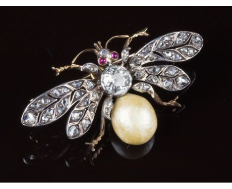 An antique 18ct yellow gold, pearl, ruby and diamond bee pendant brooch, c.1900, the bee with a single large natural pearl as