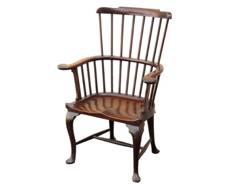 The Garrick Chair - a fine George II mahogany comb back Windsor arm chair, the back with a shaped and scratch moulded top rai