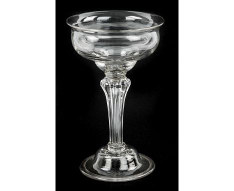 A mid-18th century champagne or sweetmeat glass, circa 1730-50, double ogee bowl on eight sided pedestal stem above collar, d