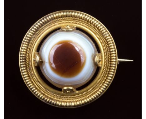 Castellani - a 19th century yellow gold and agate neo-classical brooch, c.1860, the polished, domed 'eye' agate in a classica