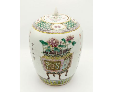 A Chinese porcelain famille rose jar and cover, 19th century, of ovoid form, with trellis border to upper area bearing four r