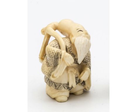 A Japanese carved ivory netsuke of Jurojin, Meiji period (1868-1912), with distinctive white beard and elongated head, carryi